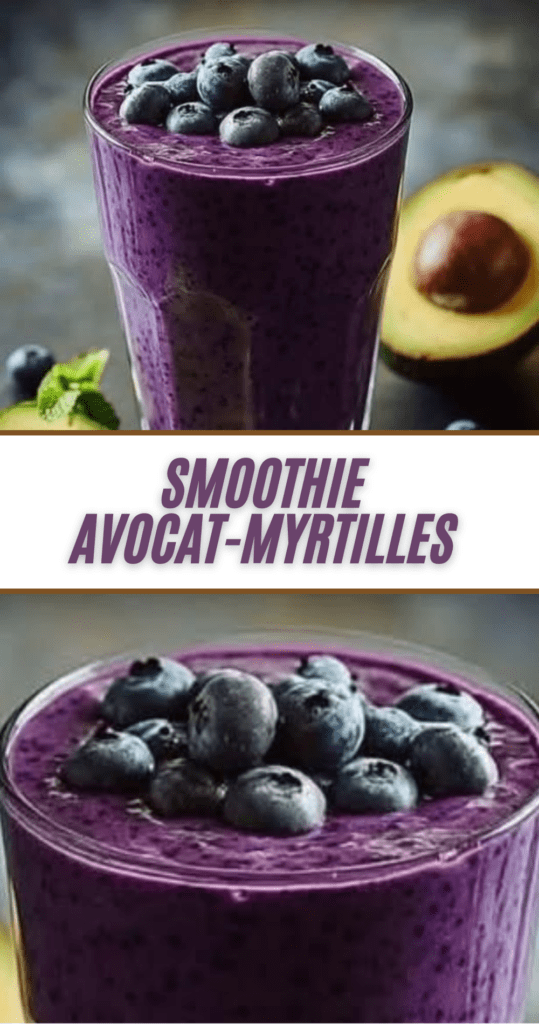 Verre de smoothie avocat-myrtilles crémeux, décoré de myrtilles fraîches et d’une tranche d’avocat.